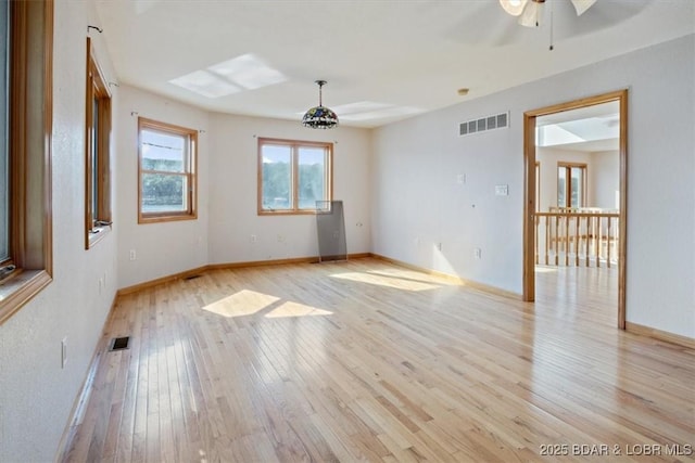 29773 Hemlock Rd, Gravois Mills, MO 65037 - spare room with ceiling fan and light wood finished floors