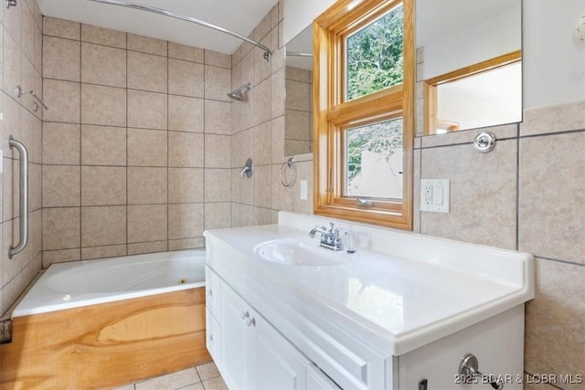 29773 Hemlock Rd, Gravois Mills, MO 65037 - bathroom featuring tile walls, vanity, washtub / shower combination, and tile patterned flooring