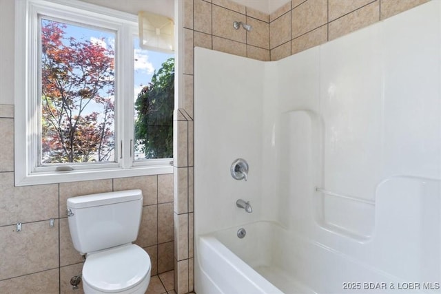 29773 Hemlock Rd, Gravois Mills, MO 65037 - bathroom with tile walls and shower / tub combination
