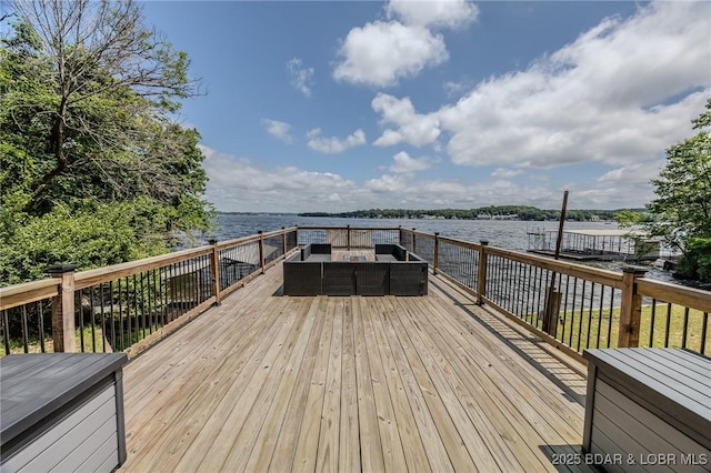 172 Kansas City Way, Sunrise Beach, MO 65079 - wooden deck featuring an outdoor hangout area and a water view