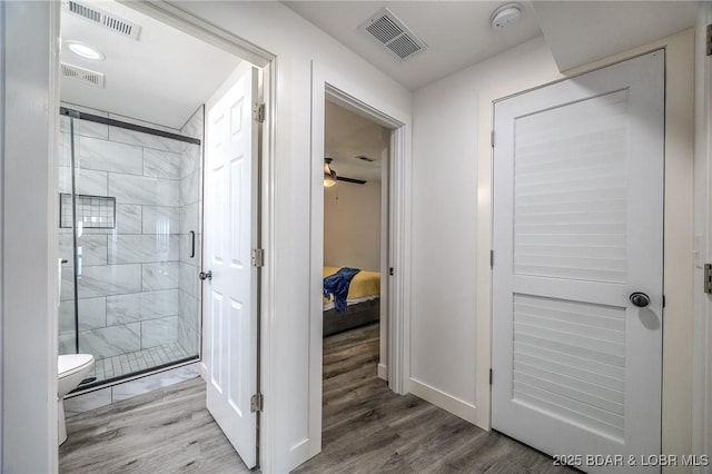 172 Kansas City Way, Sunrise Beach, MO 65079 - hall with wood finished floors and baseboards