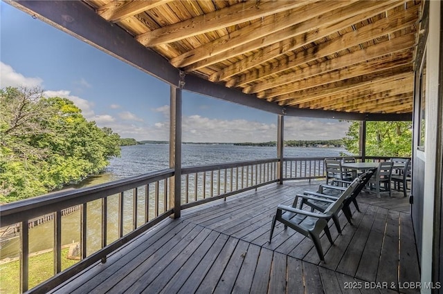 172 Kansas City Way, Sunrise Beach, MO 65079 - wooden terrace with a water view and outdoor dining area