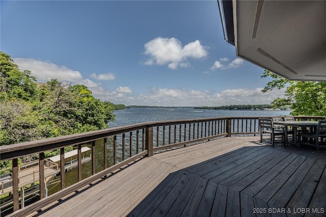 172 Kansas City Way, Sunrise Beach, MO 65079 - wooden deck featuring a water view and outdoor dining area