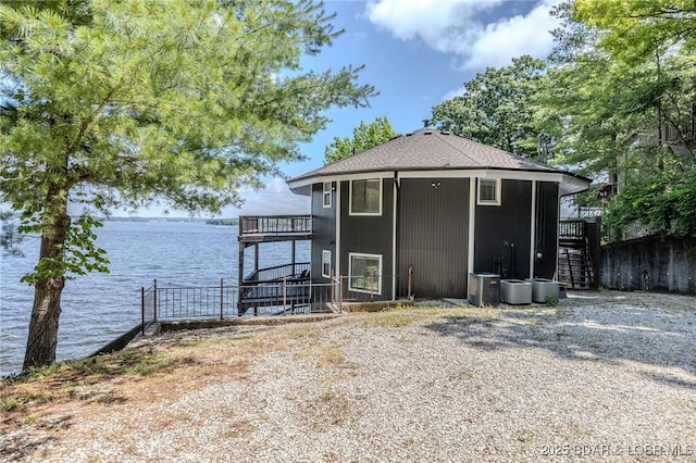 172 Kansas City Way, Sunrise Beach, MO 65079 - view of outdoor structure featuring a water view and stairs