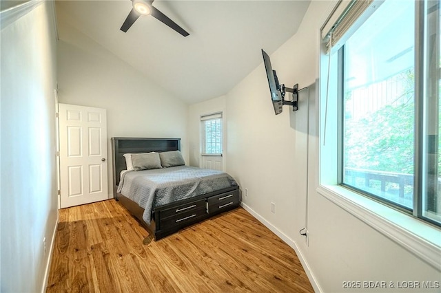 172 Kansas City Way, Sunrise Beach, MO 65079 - bedroom featuring wood finished floors, vaulted ceiling, and a ceiling fan