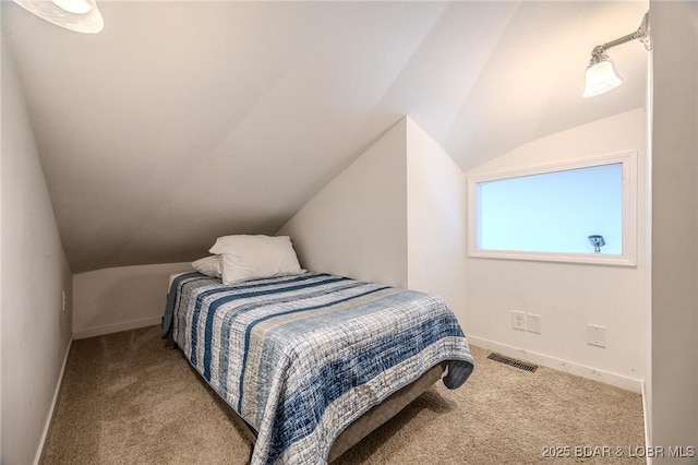 172 Kansas City Way, Sunrise Beach, MO 65079 - carpeted bedroom with vaulted ceiling and baseboards