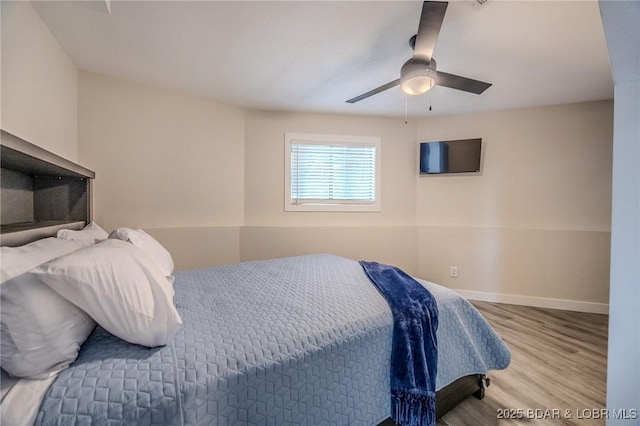 172 Kansas City Way, Sunrise Beach, MO 65079 - bedroom featuring wood finished floors and a ceiling fan