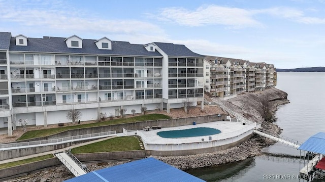 5450 Christopher Dr Unit 243, Osage Beach, MO 65065 - view of apartment building / complex with a water view