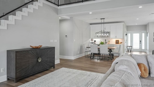 5450 Christopher Dr Unit 243, Osage Beach, MO 65065 - living area featuring wood finished floors, recessed lighting, and a chandelier