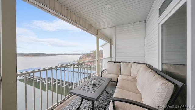 5450 Christopher Dr Unit 243, Osage Beach, MO 65065 - balcony featuring a water view and an outdoor hangout area