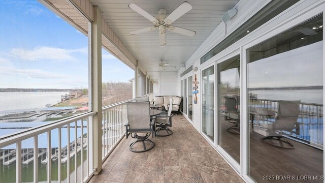 5450 Christopher Dr Unit 243, Osage Beach, MO 65065 - balcony featuring ceiling fan and a water view