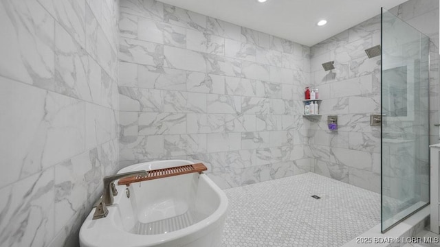5450 Christopher Dr Unit 243, Osage Beach, MO 65065 - full bath featuring tiled shower, a freestanding tub, tile walls, and recessed lighting