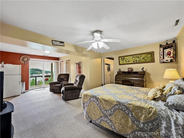 73 Good Neighbors Loop, Camdenton, MO 65020 - carpeted bedroom with freestanding refrigerator, access to outside, a textured ceiling, and a ceiling fan