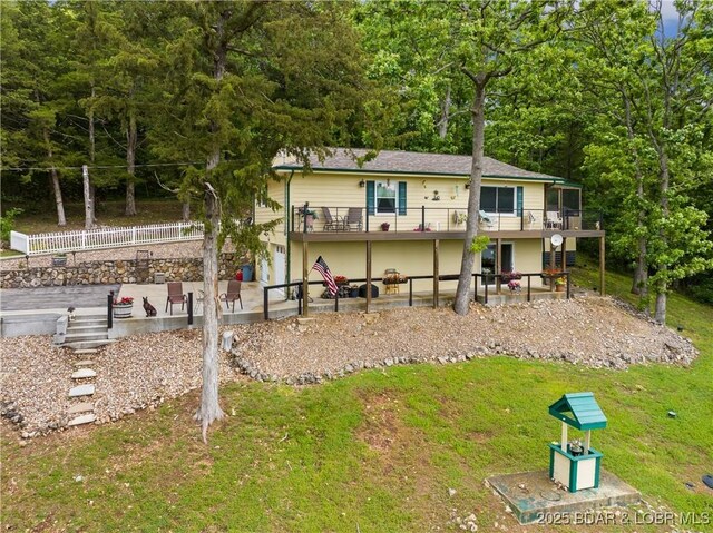 73 Good Neighbors Loop, Camdenton, MO 65020 - rear view of property with a patio, a yard, and a deck
