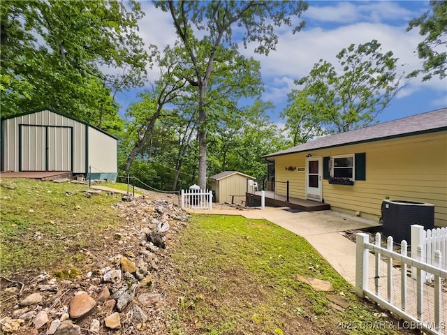 73 Good Neighbors Loop, Camdenton, MO 65020 - view of yard featuring a shed and a patio