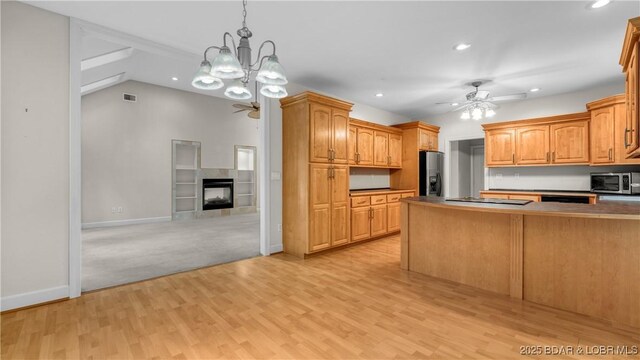 135 Greensboro Ct, Four Seasons, MO 65049 - kitchen with a ceiling fan, stainless steel microwave, refrigerator with ice dispenser, recessed lighting, and light wood-type flooring