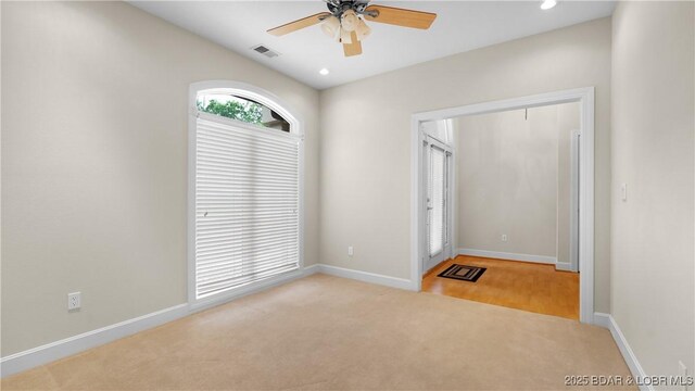 135 Greensboro Ct, Four Seasons, MO 65049 - entryway with light carpet, ceiling fan, and recessed lighting