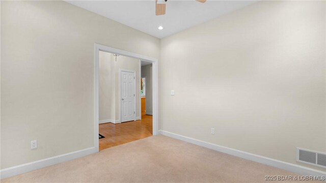 135 Greensboro Ct, Four Seasons, MO 65049 - unfurnished room featuring carpet floors, ceiling fan, and recessed lighting