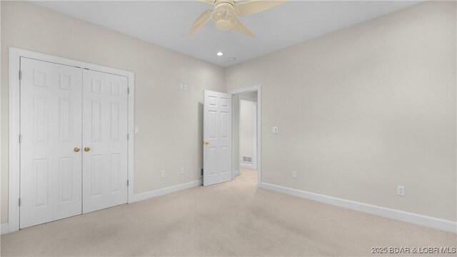 135 Greensboro Ct, Four Seasons, MO 65049 - unfurnished bedroom featuring carpet, a closet, and ceiling fan