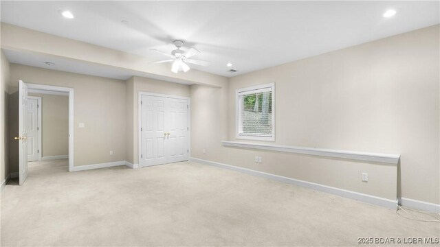 135 Greensboro Ct, Four Seasons, MO 65049 - unfurnished bedroom with light carpet, ceiling fan, a closet, and recessed lighting