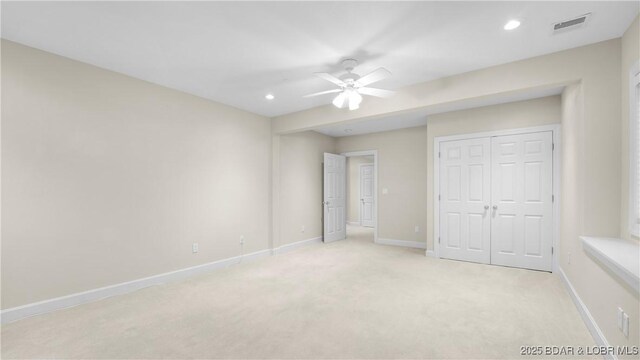135 Greensboro Ct, Four Seasons, MO 65049 - unfurnished bedroom featuring light colored carpet, recessed lighting, a closet, and a ceiling fan