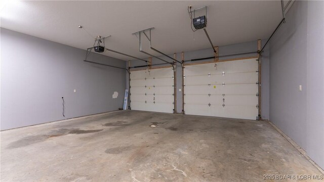 135 Greensboro Ct, Four Seasons, MO 65049 - garage with a garage door opener