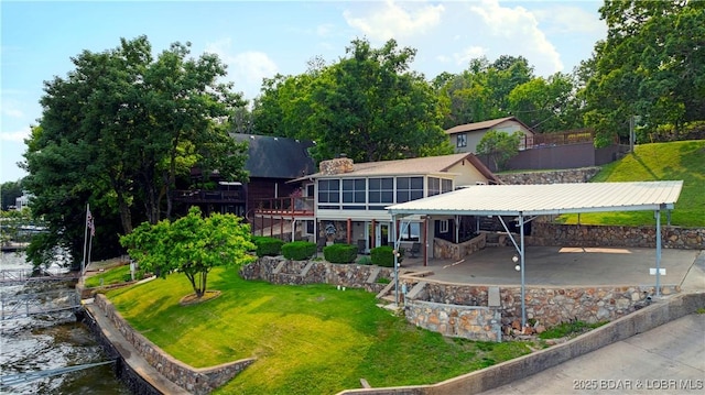 30383 Bullock Dr, Gravois Mills, MO 65037 - rear view of house with a yard, a water view, and a patio area