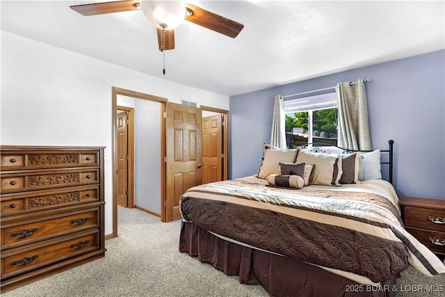 30383 Bullock Dr, Gravois Mills, MO 65037 - bedroom with light colored carpet and ceiling fan