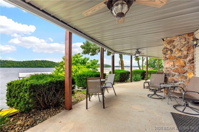 30383 Bullock Dr, Gravois Mills, MO 65037 - view of patio with ceiling fan and a water view