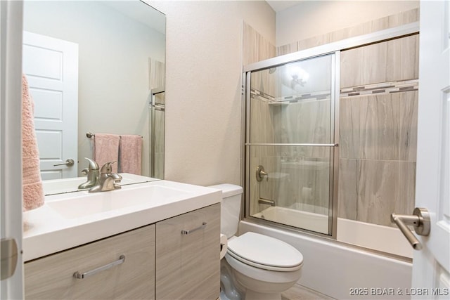 448 Cherokee Rd, Lake Ozark, MO 65049 - bathroom featuring vanity and combined bath / shower with glass door
