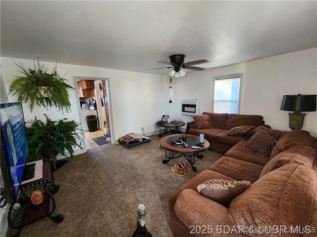 206 Oak St S, Versailles, MO 65084 - living room featuring carpet flooring, ceiling fan, and heating unit