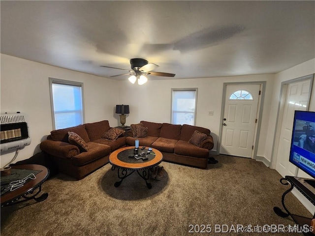 206 Oak St S, Versailles, MO 65084 - carpeted living room featuring heating unit and ceiling fan