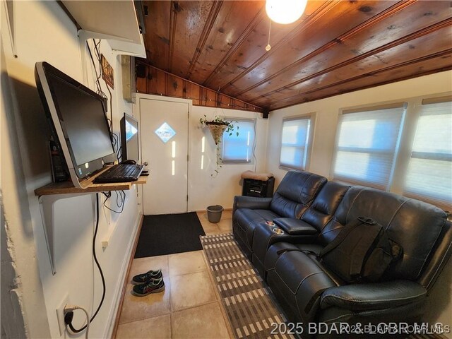 206 Oak St S, Versailles, MO 65084 - living area with vaulted ceiling, wood ceiling, and light tile patterned flooring