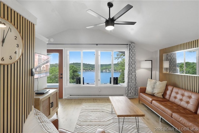 26794 Boone Rd, Barnett, MO 65011 - living area featuring a baseboard heating unit, light wood-type flooring, ceiling fan, lofted ceiling, and a water view