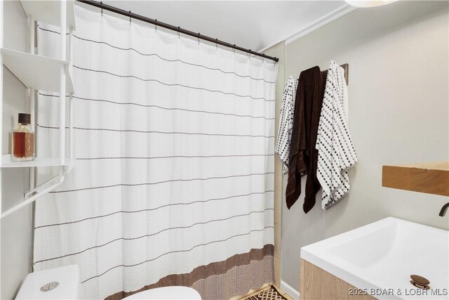 26794 Boone Rd, Barnett, MO 65011 - bathroom with toilet and a shower with shower curtain