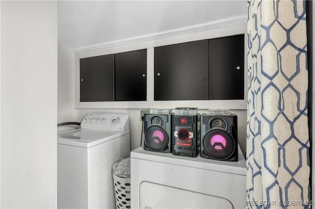 26794 Boone Rd, Barnett, MO 65011 - laundry room featuring cabinet space and independent washer and dryer