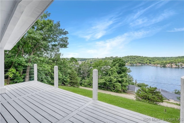 26794 Boone Rd, Barnett, MO 65011 - wooden deck featuring a water view, a yard, and a wooded view