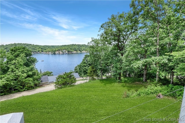 26794 Boone Rd, Barnett, MO 65011 - water view featuring a forest