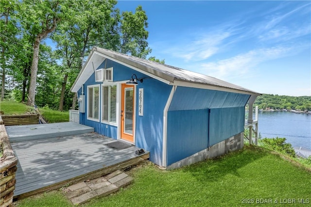 26794 Boone Rd, Barnett, MO 65011 - view of outdoor structure with a water view and an AC wall unit