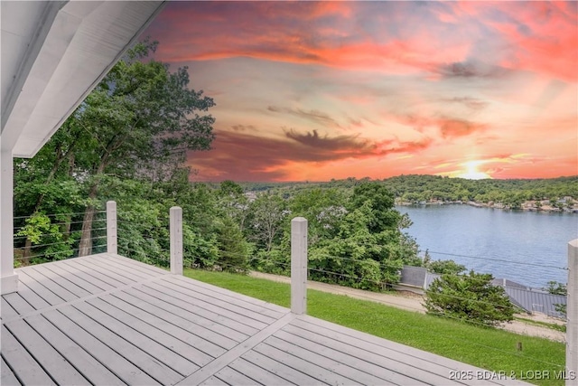 26794 Boone Rd, Barnett, MO 65011 - wooden terrace with a water view and a lawn