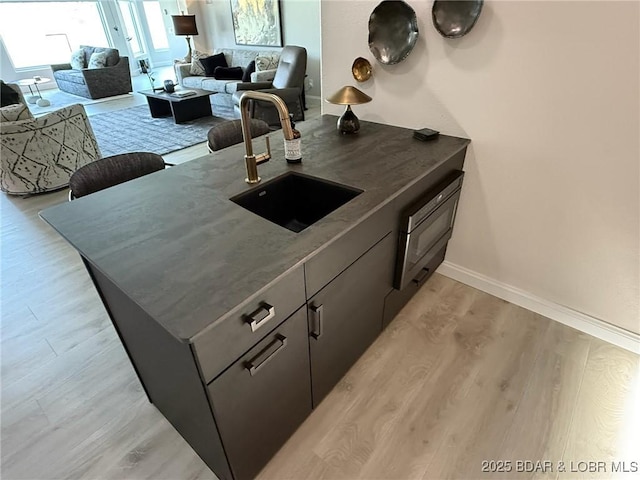 339 Cordoba Pt Unit 13B, Porto Cima, MO 65079 - kitchen with open floor plan and light wood-style floors