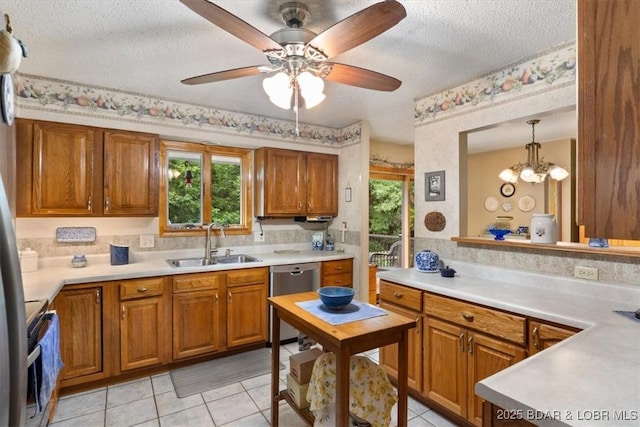 28 Wood River Rd, Lake Ozark, MO 65049 - kitchen featuring stainless steel dishwasher, electric range, a textured ceiling, brown cabinets, and light countertops