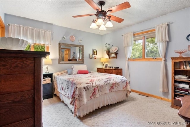 28 Wood River Rd, Lake Ozark, MO 65049 - bedroom with light colored carpet, a textured ceiling, and ceiling fan
