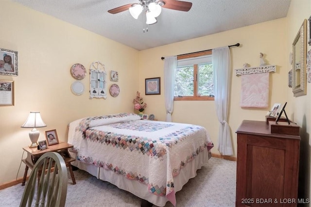 28 Wood River Rd, Lake Ozark, MO 65049 - bedroom with carpet floors, a ceiling fan, and a textured ceiling
