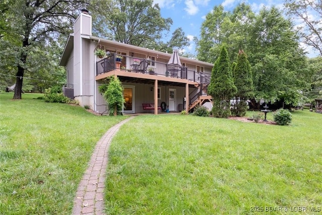 28 Wood River Rd, Lake Ozark, MO 65049 - back of property with a wooden deck, stairway, a chimney, and a yard