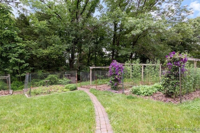 28 Wood River Rd, Lake Ozark, MO 65049 - view of yard featuring a garden