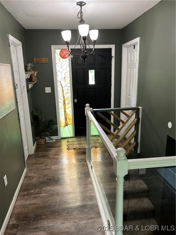 121 Banner St, Camdenton, MO 65020 - entrance foyer featuring wood finished floors and a chandelier