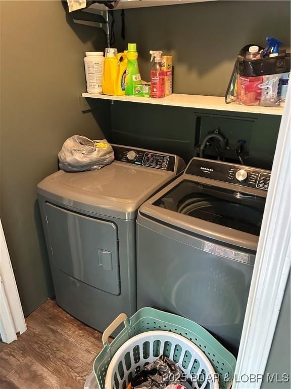 121 Banner St, Camdenton, MO 65020 - washroom featuring independent washer and dryer and wood finished floors