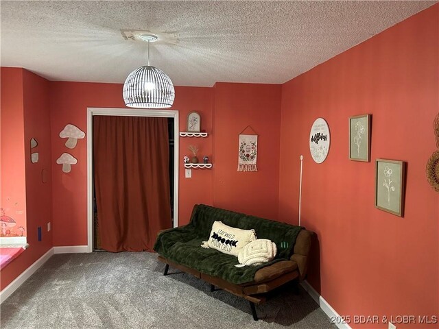 121 Banner St, Camdenton, MO 65020 - living area with carpet floors, a textured ceiling, and a chandelier