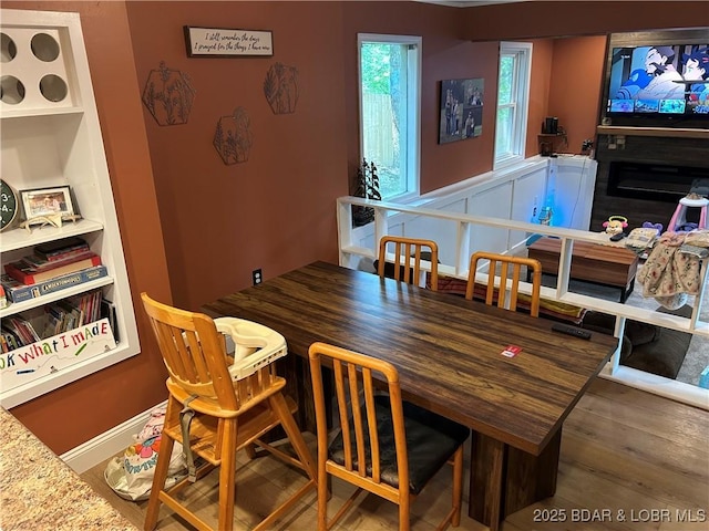 121 Banner St, Camdenton, MO 65020 - dining room featuring wood finished floors